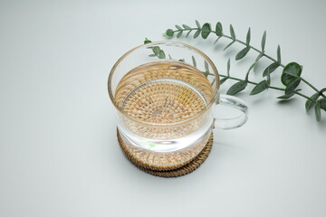 Glass with water on a white background