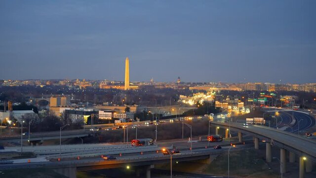 Panoramic view on Washington DC and road traffic from Rosslyn at dusk