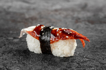 Unagi sushi with eel on stone