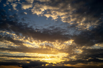 Naklejka na ściany i meble sunset in the clouds