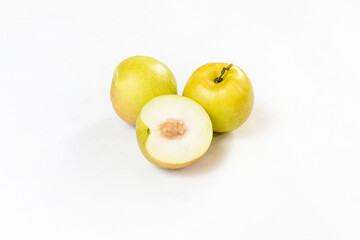 Fresh and ripe indian Jujube fruits on white isolated background.