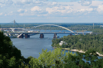Construction of a new big bridge over a Dnieper river in Kyiv, Ukraine