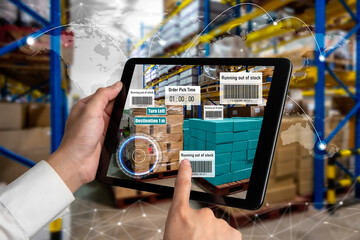 Fototapeta Smart warehouse management system using augmented reality technology to identify package picking and delivery . Future concept of supply chain and logistic business . obraz