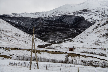 Fototapeta premium panoramic landscape of the snow-capped mountains and gorges of the Caucasus