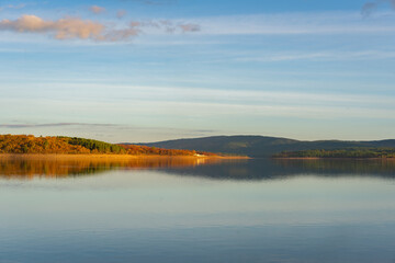Lake reservoir dam landscape view at sunset during autumn fall in Sabugal Dam, Portugal