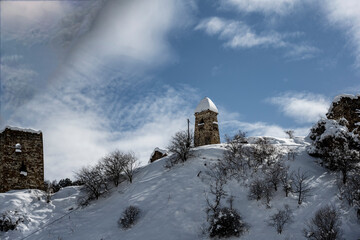 ruins and towers of ancient structures in the Caucasus mountains in Ingushetia 