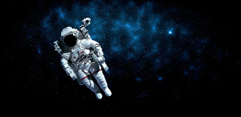 Astronaut spaceman do spacewalk while working for space station in outer space . Astronaut wear full spacesuit for space operation . Elements of this image furnished by NASA space astronaut photos. © InfiniteFlow