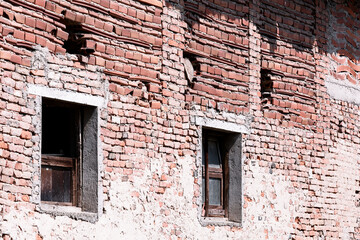 Fototapeta na wymiar vintage background texture old masonry stone bricks on the ancient cement with cracks