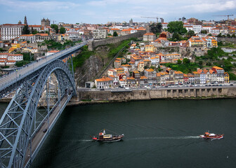 Spring in Portugal. Duoro river and view of the rooftops of the old city of Porto. Ponte Luís I. Vila Nova de Gaia bridge. Portugal.