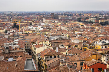 Fototapeta premium Picturesque aerial view of the city of Verona from the Torre dei Lamberti at sunset. Verona, Veneto region, Italy.