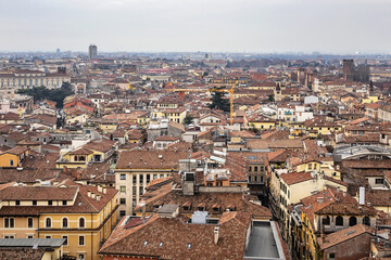 Fototapeta premium Picturesque aerial view of the city of Verona from the Torre dei Lamberti at sunset. Verona, Veneto region, Italy.