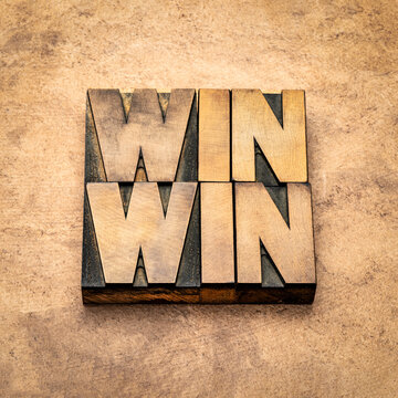 win-win - negotiation or conflict resolution strategy  -  word abstract in vintage letterpress wood type against handmade paper