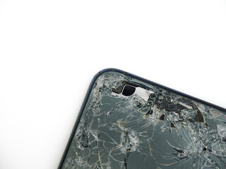 The angle of back midnight green modern smartphone has broken glass on white background. Modern smartphone with damaged back glass.