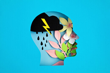 Papercut head, adult bipolar disorder concept. Mental health problems, psychology, mental illness - obrazy, fototapety, plakaty