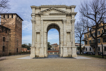 Fototapeta na wymiar The Arco dei Gavi is a monumental Roman architecture of Verona, erected around middle of first century along Via Postumia just outside the walls of the Roman city. Verona, Italy.
