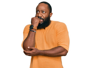 Young african american man wearing casual clothes looking stressed and nervous with hands on mouth...