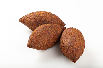 kibbeh traditional Lebanese cuisine food, known in Brazil as Quibe (kibe). Isolated on white...