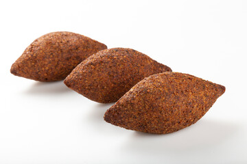 kibbeh traditional Lebanese cuisine food, known in Brazil as Quibe (kibe). Isolated on white background.