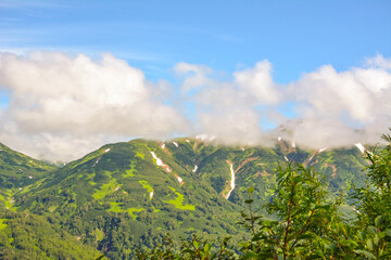 mountain landscape: clouds envelop the mountains. Kamchatka Russia