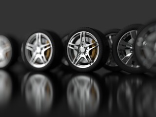 Obraz na płótnie Canvas a large number of auto wheels with chrome rims. 3d render