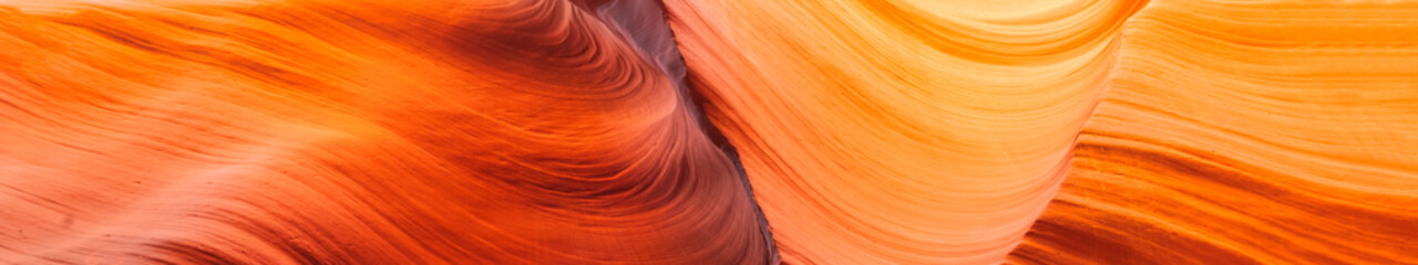 panoramic abstract orange and yellow background. Background sandstone walls and texture. Famous Antelope Canyon. Arizona.