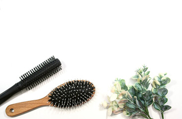 Professional combs on a white background. Three combs on a light background. Space for the text.