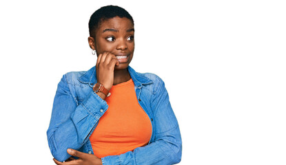 Young african american woman wearing casual clothes looking stressed and nervous with hands on...