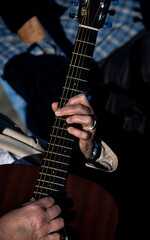 Fototapeta na wymiar Fingers of Guitar Player