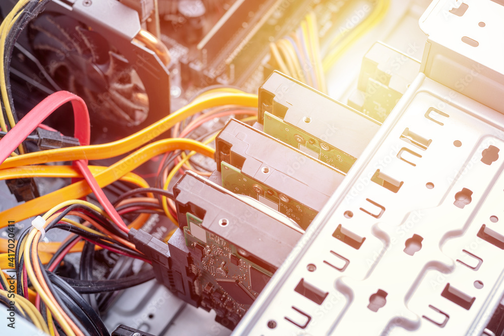 Aufkleber close up open desktop pc for hardware maintenance. hdd raid massive for data storage. dust cleaning 