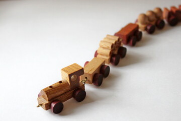 wooden toy train on a white background
