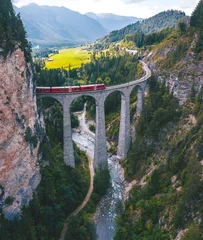 Peel and stick wall murals Landwasser Viaduct Aerial view of red train passing the Landwasser viaduct, Switzerland 