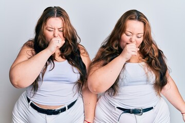 Plus size caucasian sisters woman wearing casual white clothes feeling unwell and coughing as symptom for cold or bronchitis. health care concept.