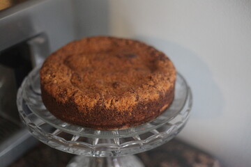 COFFEE CAKE ON A GLASS PLATE 