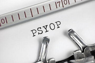 Psychological operations acronym PSYOP text macro closeup, typewriter typed behavior reasoning...