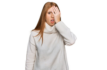 Young irish woman wearing casual winter sweater yawning tired covering half face, eye and mouth with hand. face hurts in pain.