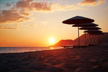 Beautiful landscape. Traveling by Turkey. Sea Beach with sunloungers and umbrellas.
