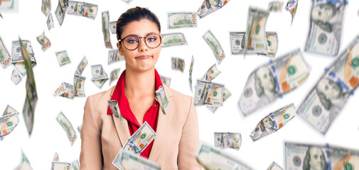 Young beautiful woman wearing business shirt and glasses depressed and worry for distress, crying...