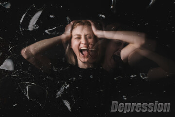Depressed young woman on dark background