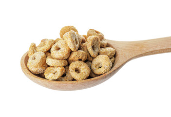 Spoon with tasty cereal rings on white background
