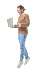 Jumping young man with laptop on white background