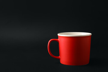 Empty cup on dark background