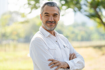 portrait happy mature man looking at camera
