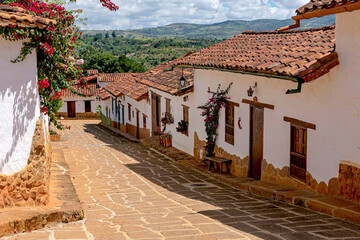 hamlet in the town of Guane, Santander, with its cobbled streets and houses adorned with flowers.