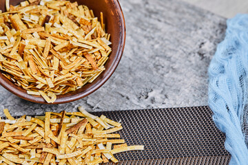 Bowl of crackers on marble background