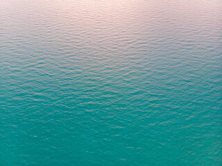 Sea surface aerial view,Bright light blue transparent clean Water,Picture taken from above.