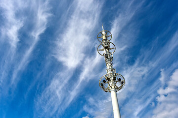Fototapeta na wymiar Wireless communication equipment on the shore under the background of blue sky and white clouds