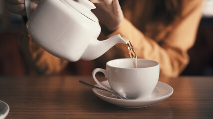 hot tea in a cup on the table breakfast as a lifestyle