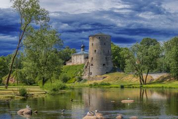 View of the Gremyachaya Tower and the ancient Kosmodamian Church (Kosma and Damian) on a cloudy...