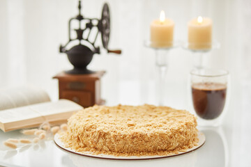 Cake, book and coffee. Morning minimalism concept