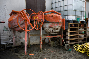 Old concrete mixers on the site after construction